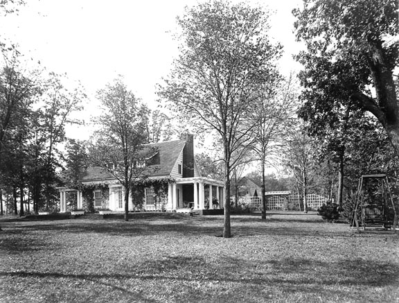 house, yard, and north porch from northeast